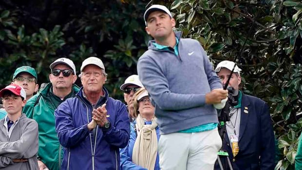 Scottie Scheffler watches a shot on Saturday at the 2022 Masters.